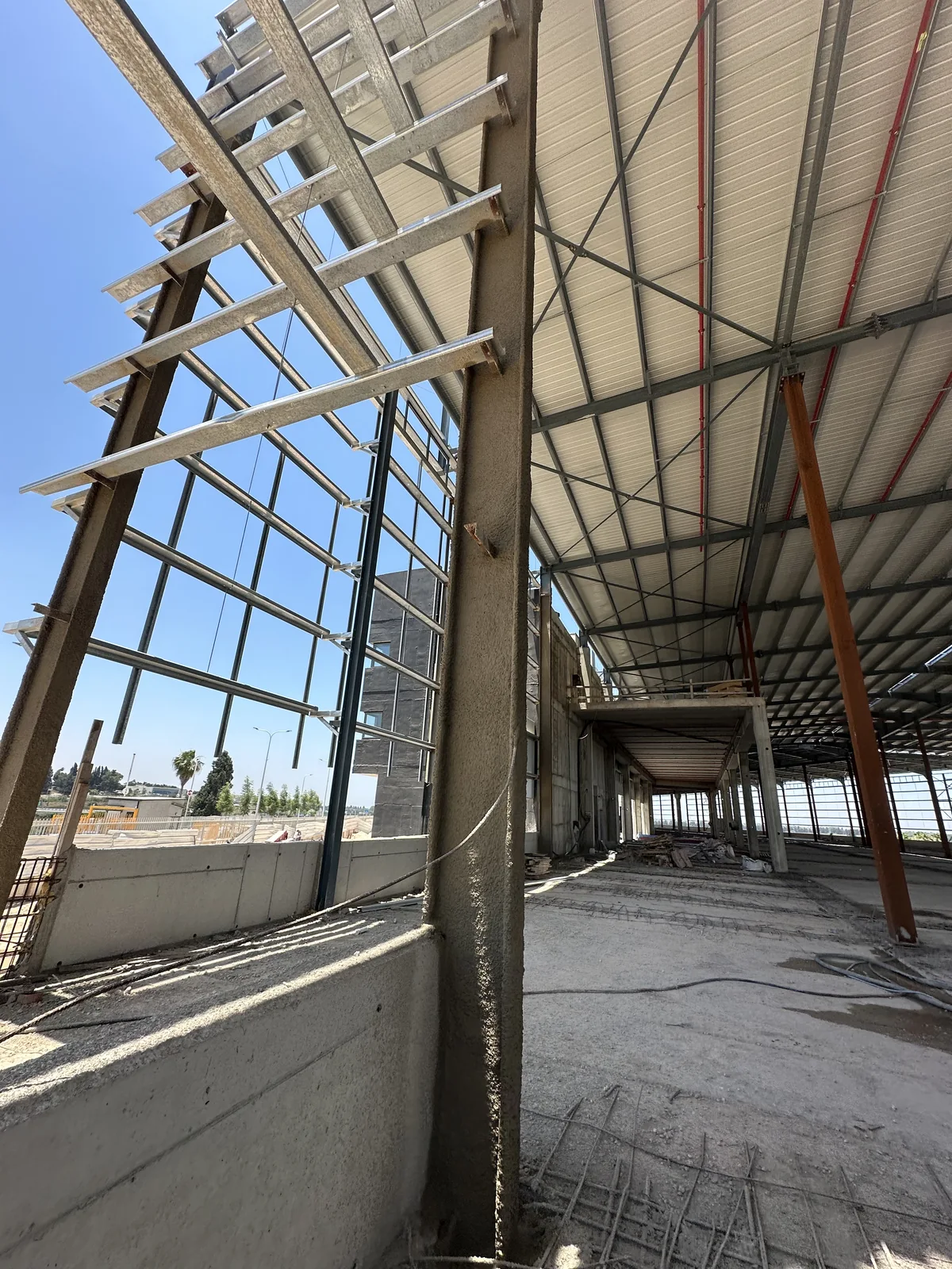 Steel column with cementitious protection — Barkai Logistics Center
