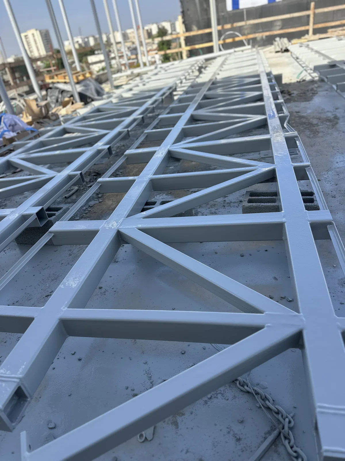 Coated steel trusses on site — Center of Excellence