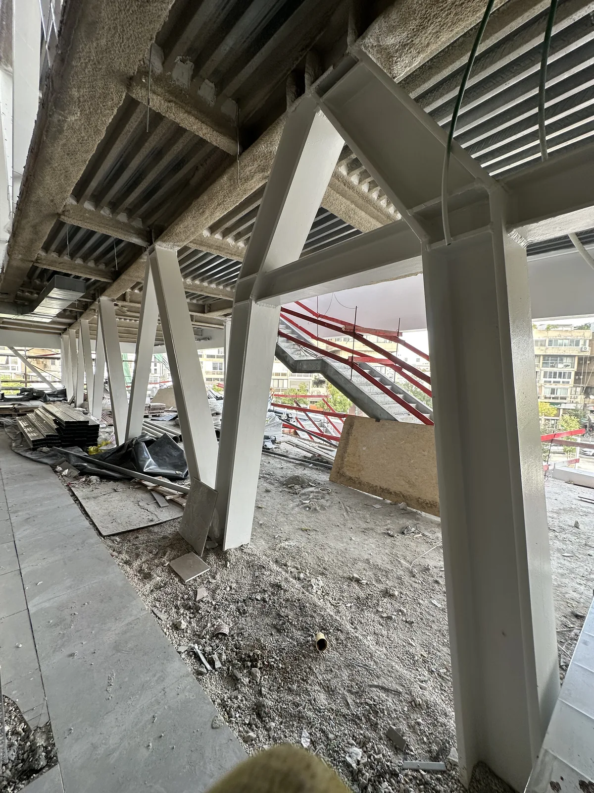 Coated steel columns and diagonal bracing — Kikar Hamedina School